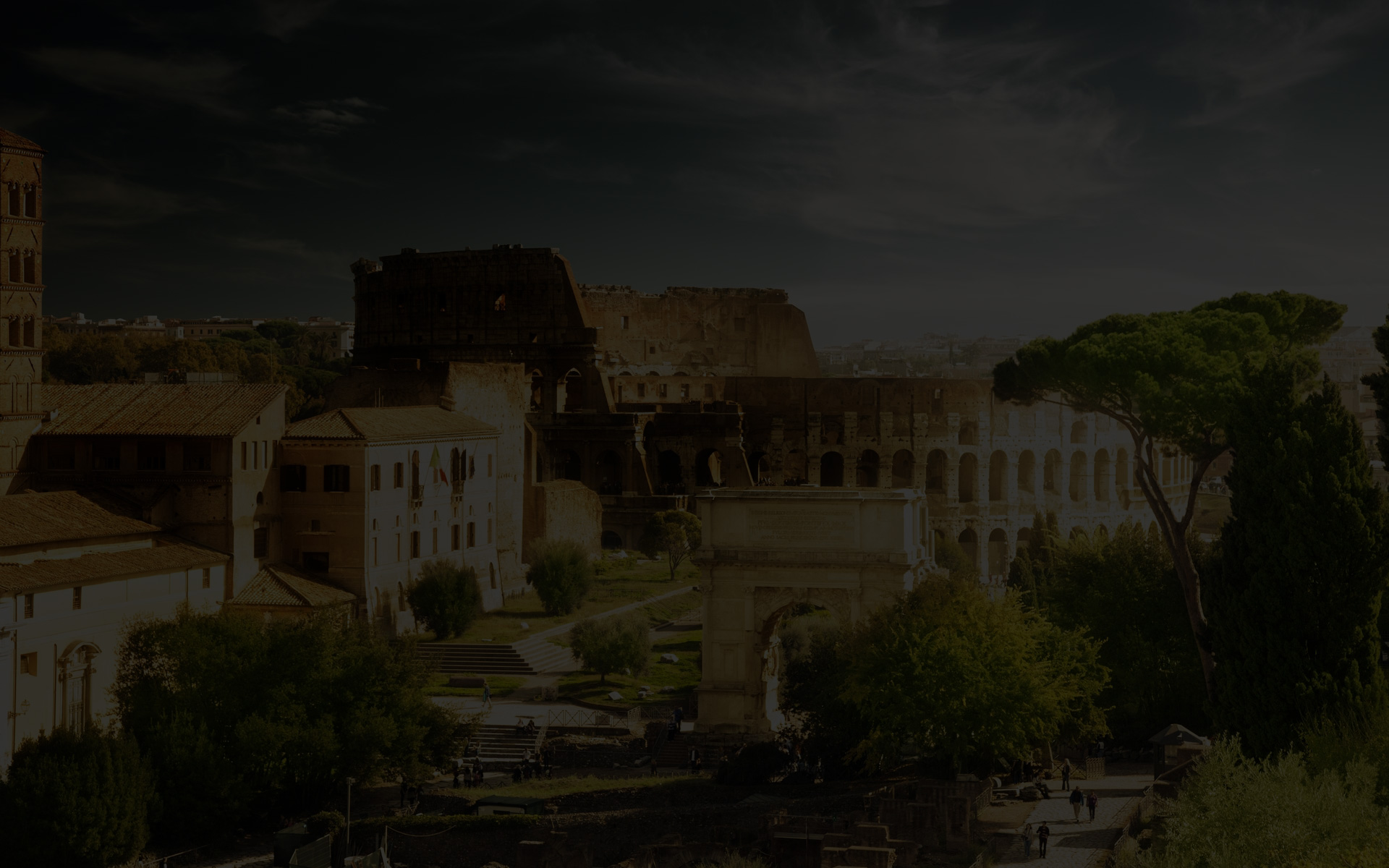 Background for the featured video, a dark overlay over the beautiful Roman Coliseum
